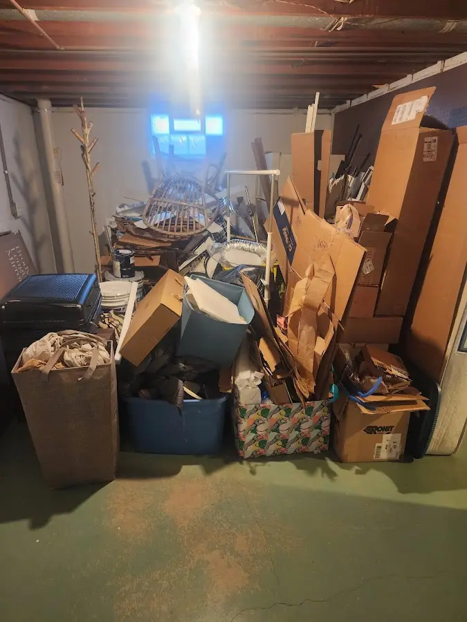 Roll-off dumpster container at job site for 4 Yard Dumpster Rental in Green Forest